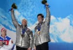 Steven Holcomb and Steve Langton pose on the Olympic podium after winning bronze medals in Sochi.