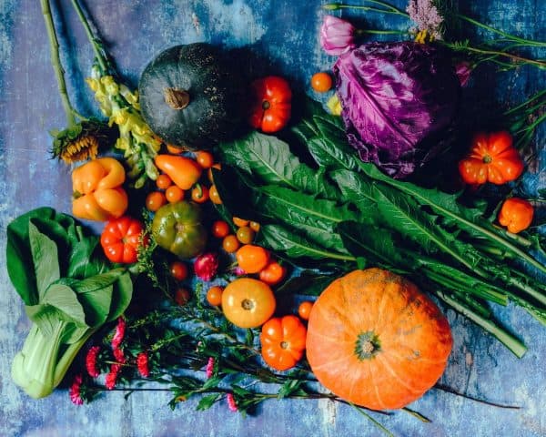 Fresh citrus fruits and leafy greens rich in vitamin C